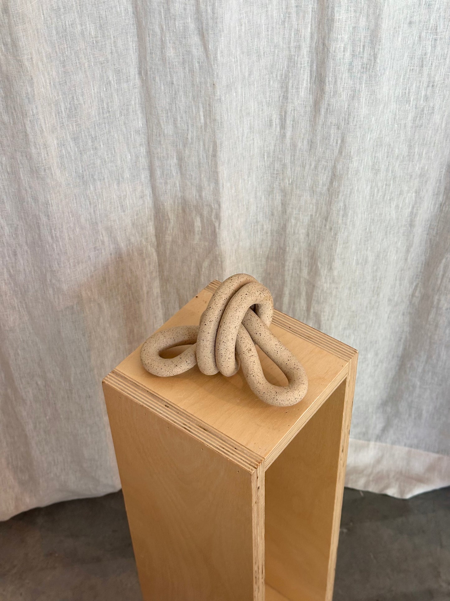 Double Loop Knot - Raw Speckled